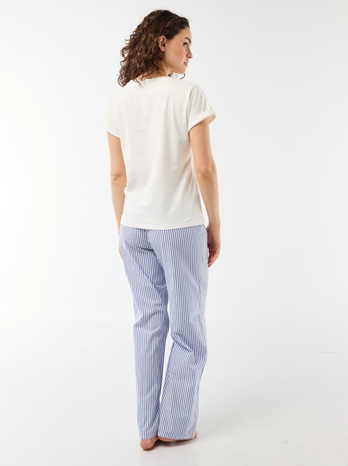 2-delige pyjamaset: T-shirt + gestreepte pyjamabroek - Kiabi 2-delige pyjamaset: T-shirt + gestreepte pyjamabroek - Kiabi