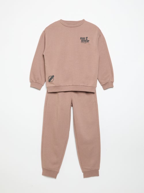 2-delige sporttrainingset met sweater en broek - Kiabi 2-delige sporttrainingset met sweater en broek - Kiabi