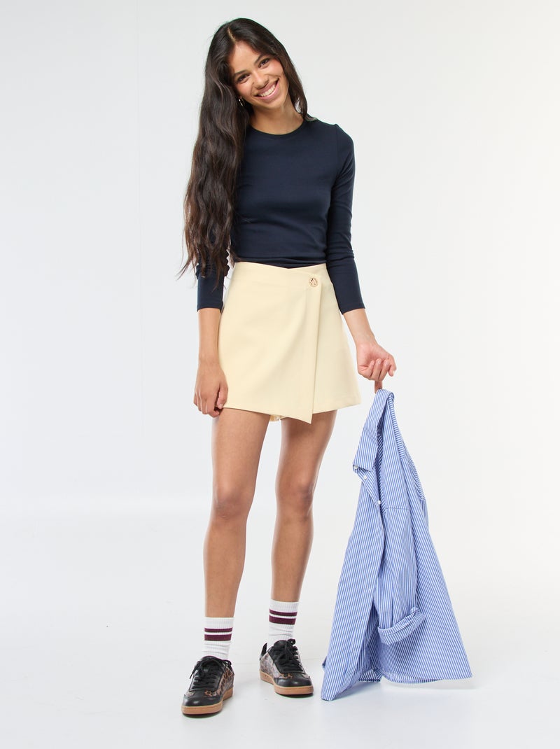 Asymmetrische skort met goudkleurige knoop Geel - Kiabi