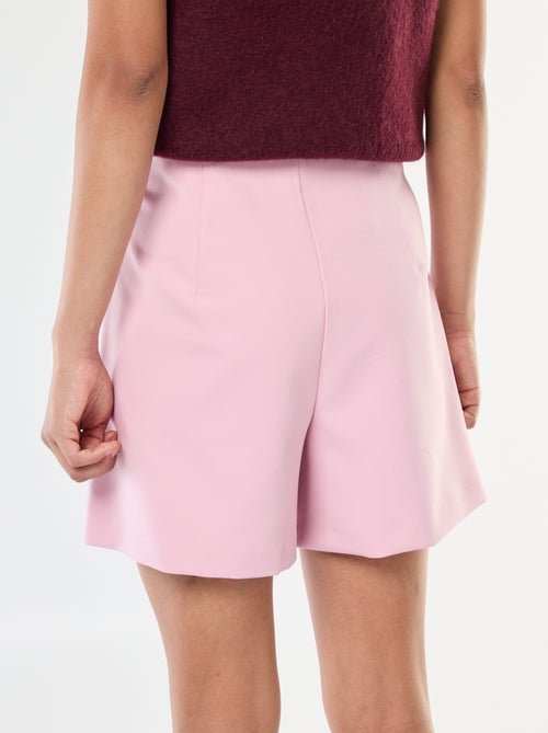 Asymmetrische skort met goudkleurige knoop - Kiabi