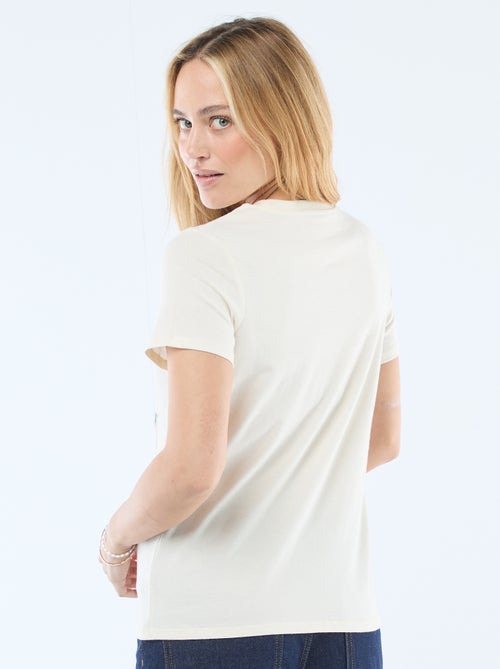 Bedrukt dames-T-shirt van katoen met ronde hals - Kiabi Bedrukt dames-T-shirt van katoen met ronde hals - Kiabi