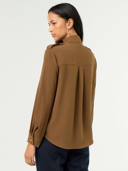 Blouse met hoge kraag en schouderstukken - Kiabi Blouse met hoge kraag en schouderstukken - Kiabi