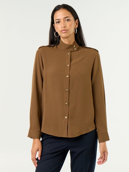 Blouse met hoge kraag en schouderstukken - Kiabi Blouse met hoge kraag en schouderstukken - Kiabi