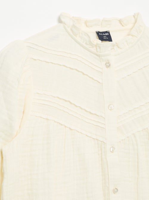 Blouse met rucheskraag en borduurwerk - Kiabi Blouse met rucheskraag en borduurwerk - Kiabi