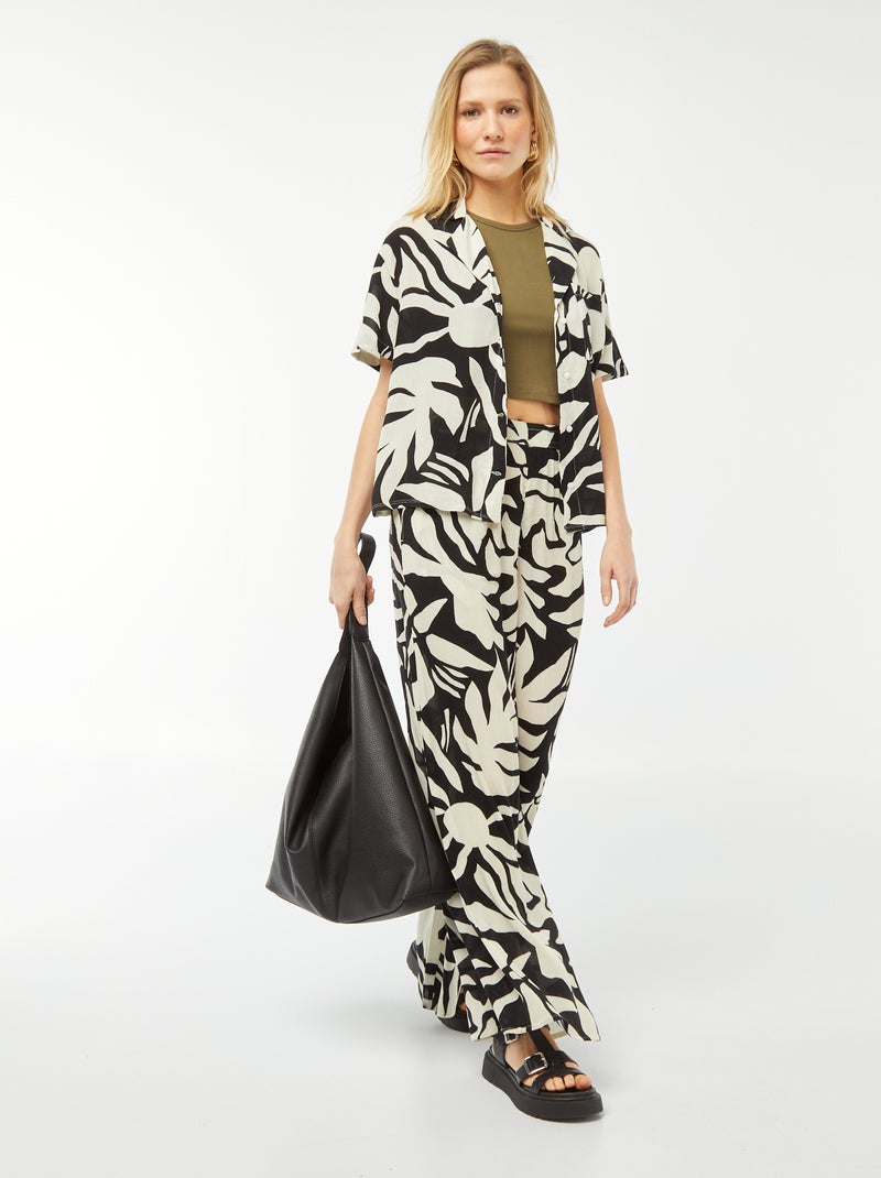 Blouse van kreukeltricot met korte mouw en motiefje ZWART - Kiabi