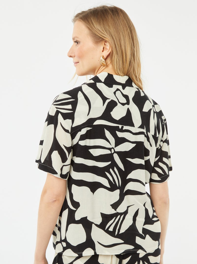 Blouse van kreukeltricot met korte mouw en motiefje ZWART - Kiabi