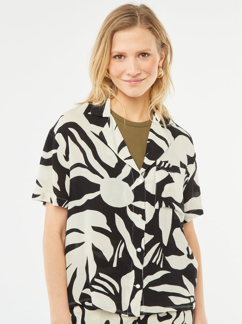 Blouse van kreukeltricot met korte mouw en motiefje ZWART - Kiabi