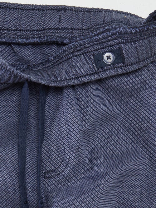 Broek met visgraatmotiefje en zakken met klepje - Kiabi