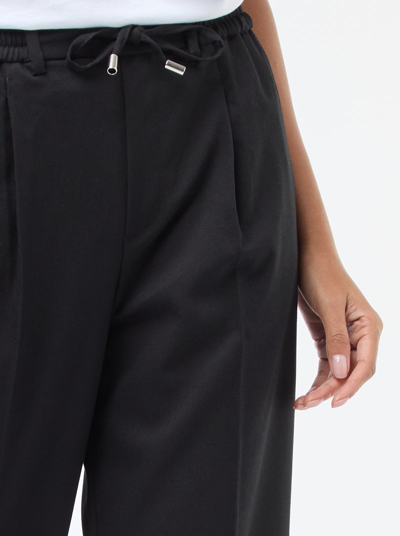 Broek met wijde pijpen, elastische tailleband en strikbandjes Zwart - Kiabi