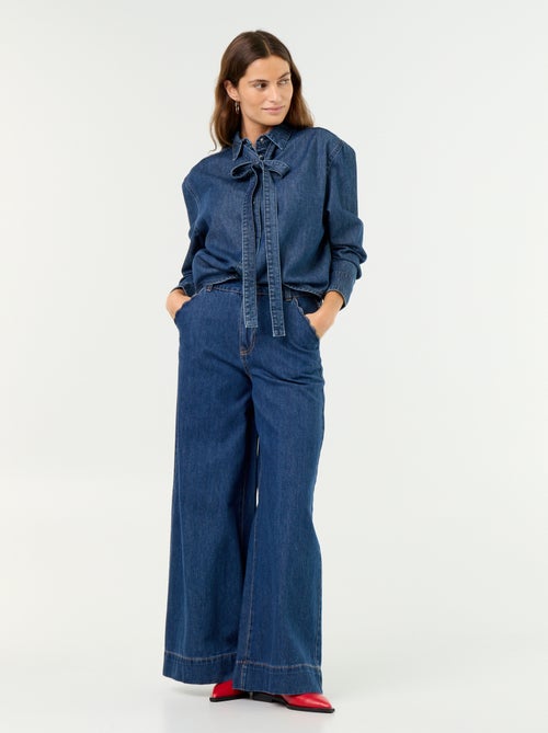 Denim overhemd met lavallièrekraag - Kiabi Denim overhemd met lavallièrekraag - Kiabi