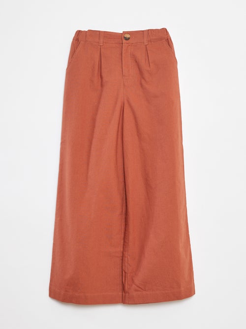 Een kleurrijke broek met wijde pijpen - Kiabi