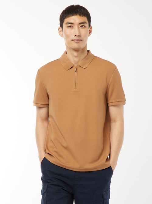 Een polo met wafeltextuur en ritsje aan de hals! - Kiabi