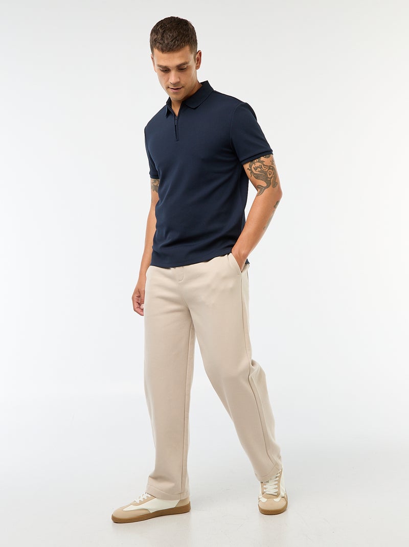 Een polo met wafeltextuur en ritsje aan de hals! Blauw - Kiabi