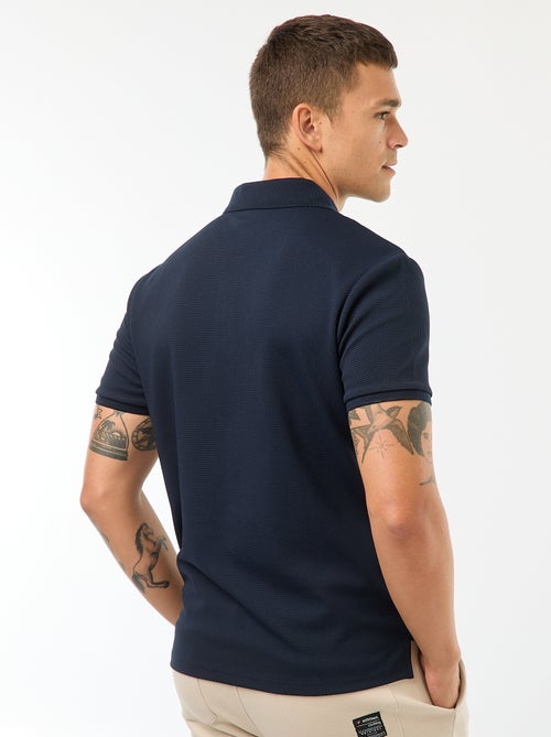 Een polo met wafeltextuur en ritsje aan de hals! - Kiabi