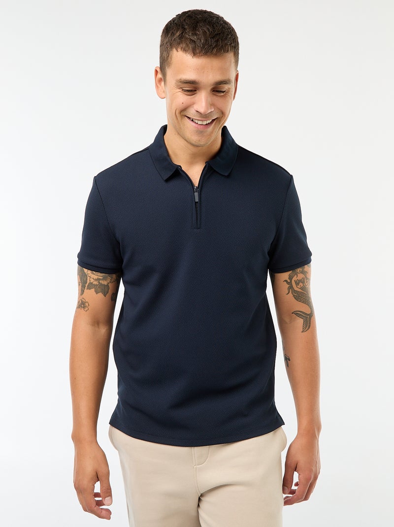 Een polo met wafeltextuur en ritsje aan de hals! Blauw - Kiabi