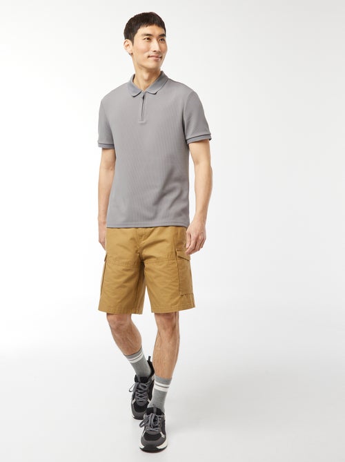 Een polo met wafeltextuur en ritsje aan de hals! - Kiabi