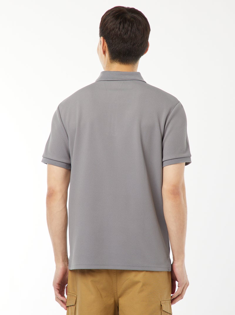 Een polo met wafeltextuur en ritsje aan de hals! GRIJS - Kiabi