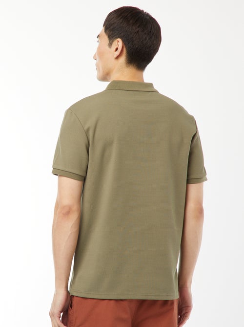 Een polo met wafeltextuur en ritsje aan de hals! - Kiabi