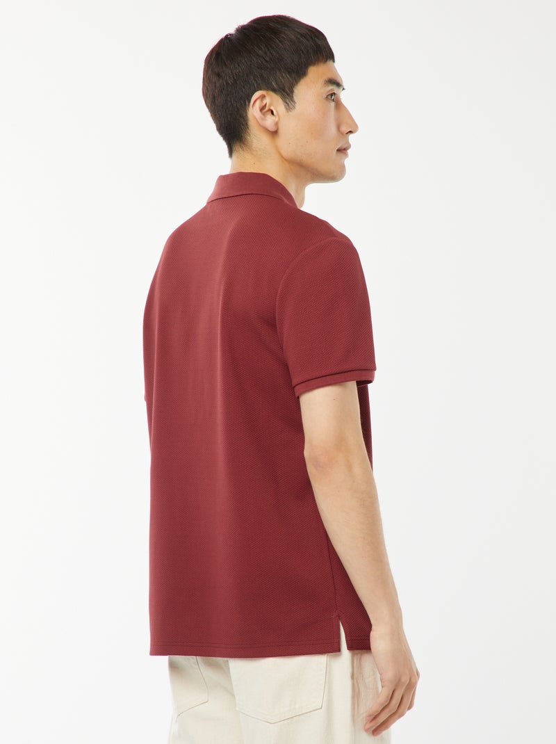 Een polo met wafeltextuur en ritsje aan de hals! ROOD - Kiabi