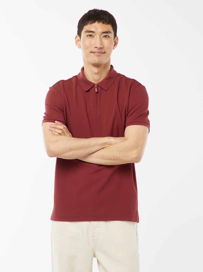 Een polo met wafeltextuur en ritsje aan de hals! ROOD - Kiabi