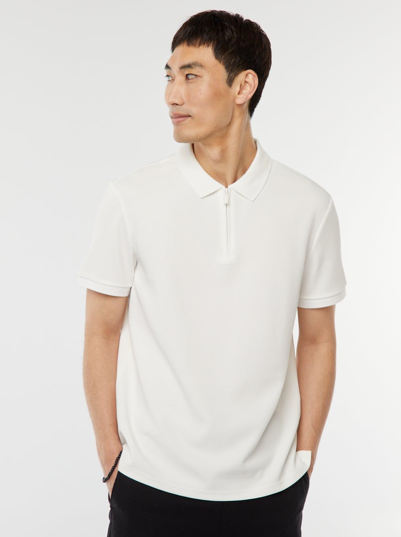 Een polo met wafeltextuur en ritsje aan de hals! WIT - Kiabi