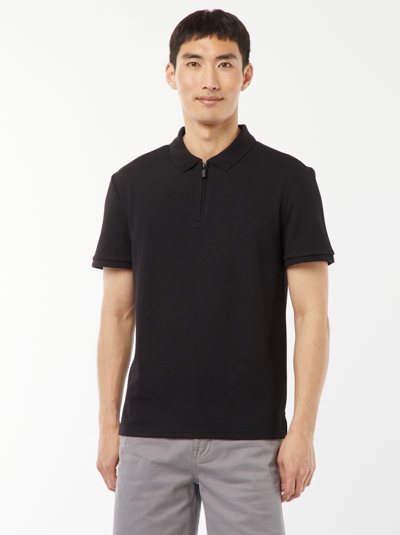 Een polo met wafeltextuur en ritsje aan de hals! zwart - Kiabi