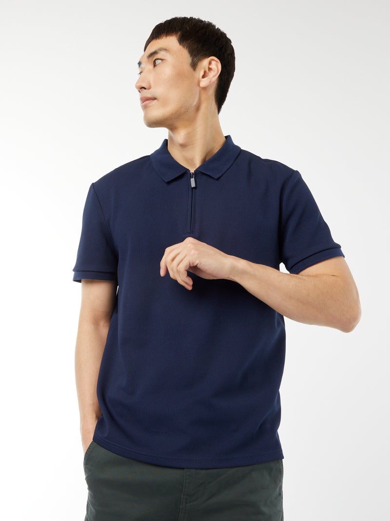 Een polo met wafeltextuur en ritsje aan de hals! ZWART - Kiabi