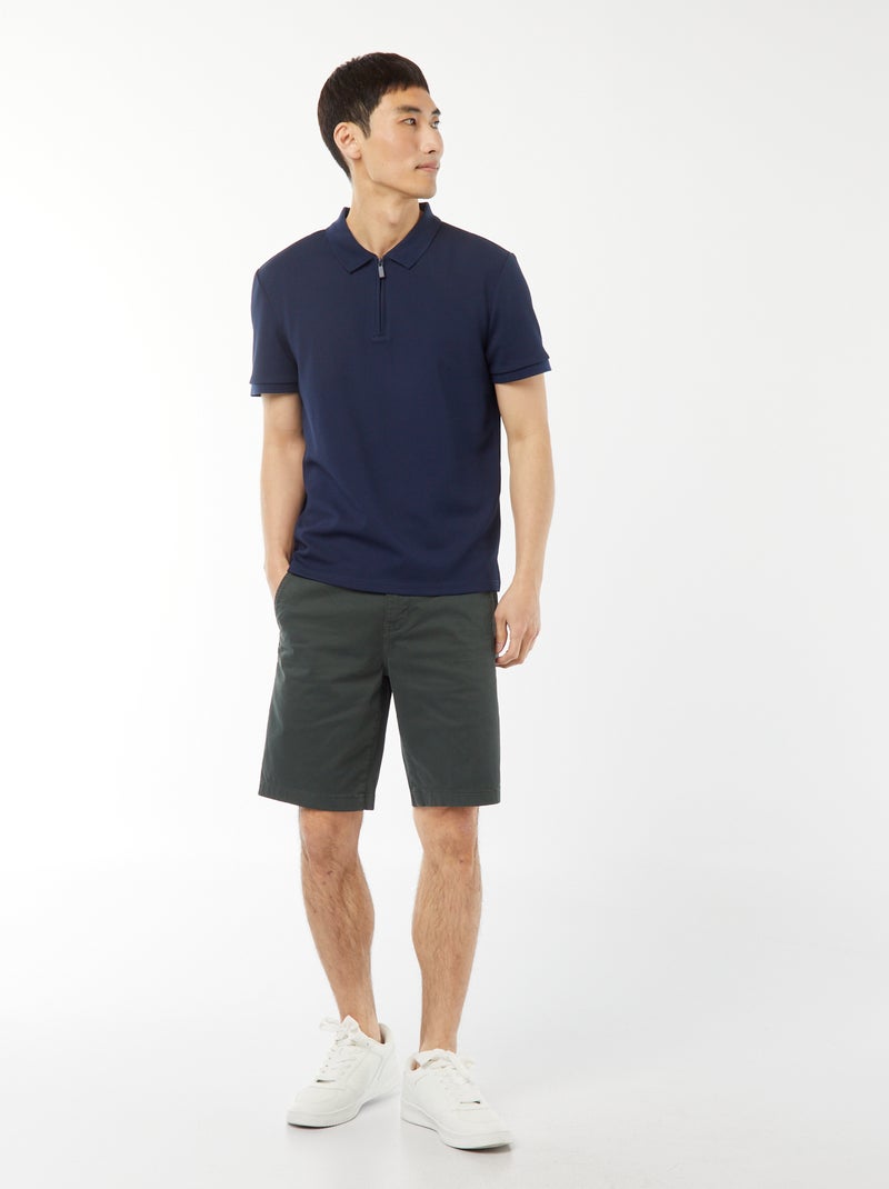 Een polo met wafeltextuur en ritsje aan de hals! ZWART - Kiabi