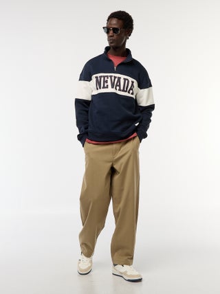 Effen broek van keperstof met wijde pijpen