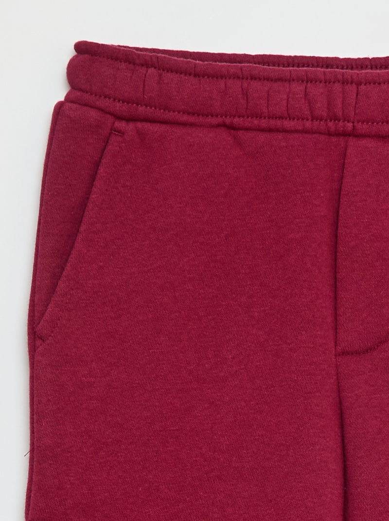 Effen fleece joggingbroek met zakken Rood - Kiabi