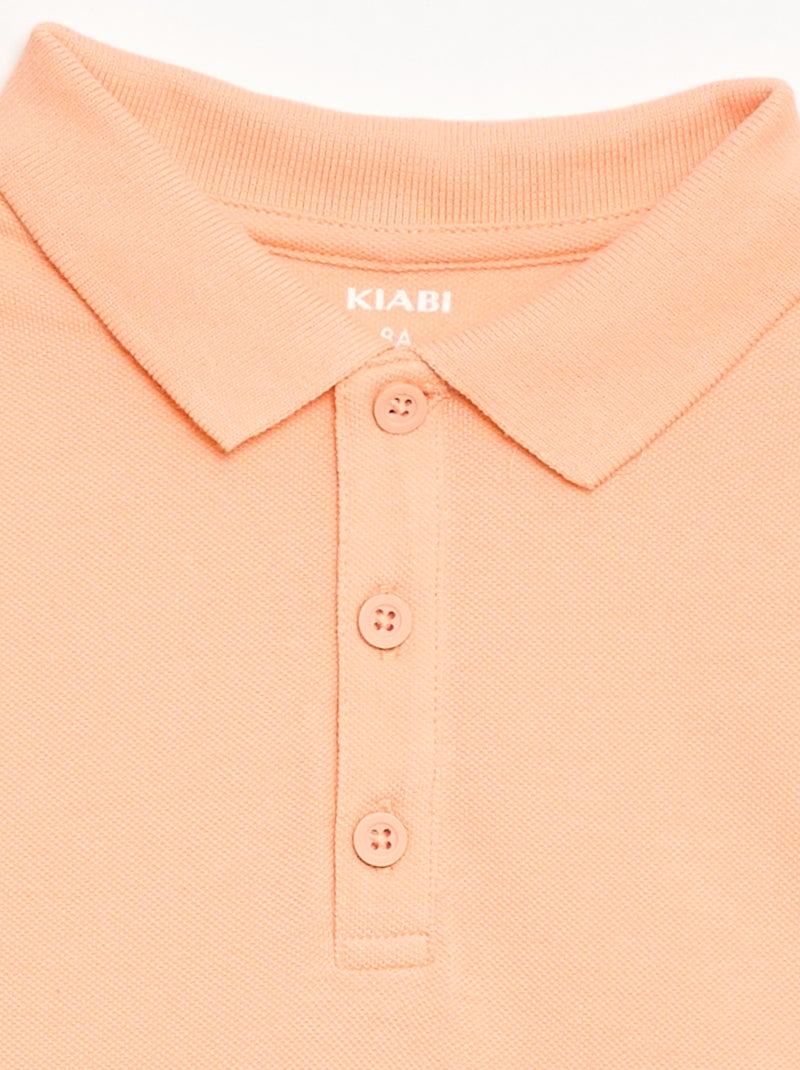 Effen polo van piquétricot Perzik - Kiabi