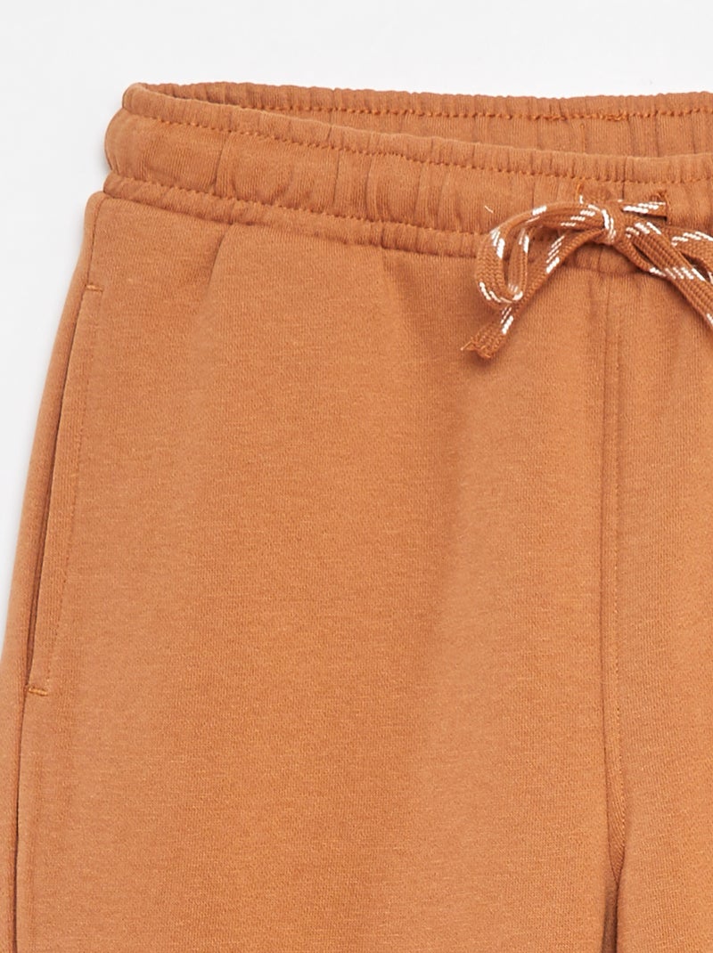 Effen, rechte joggingbroek - Comfortabel model Bruin - Kiabi