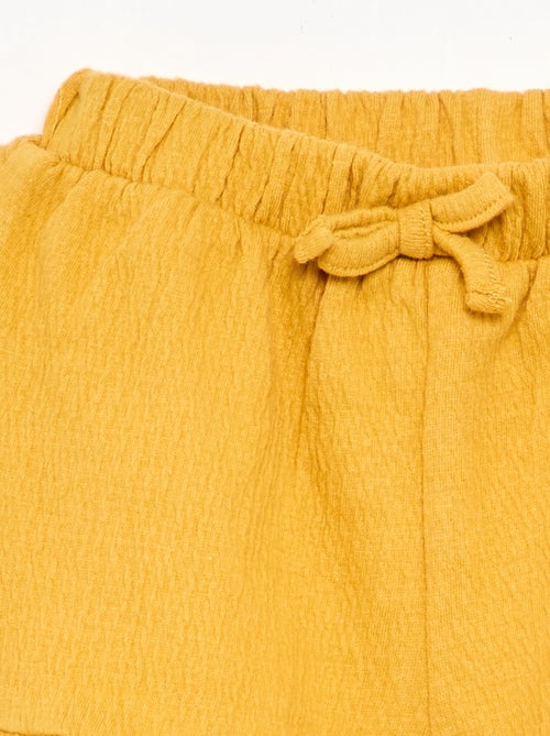 Effen short van kreukelbreisel - Kiabi Effen short van kreukelbreisel - Kiabi