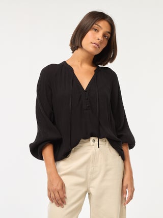 Effen soepelvallende blouse