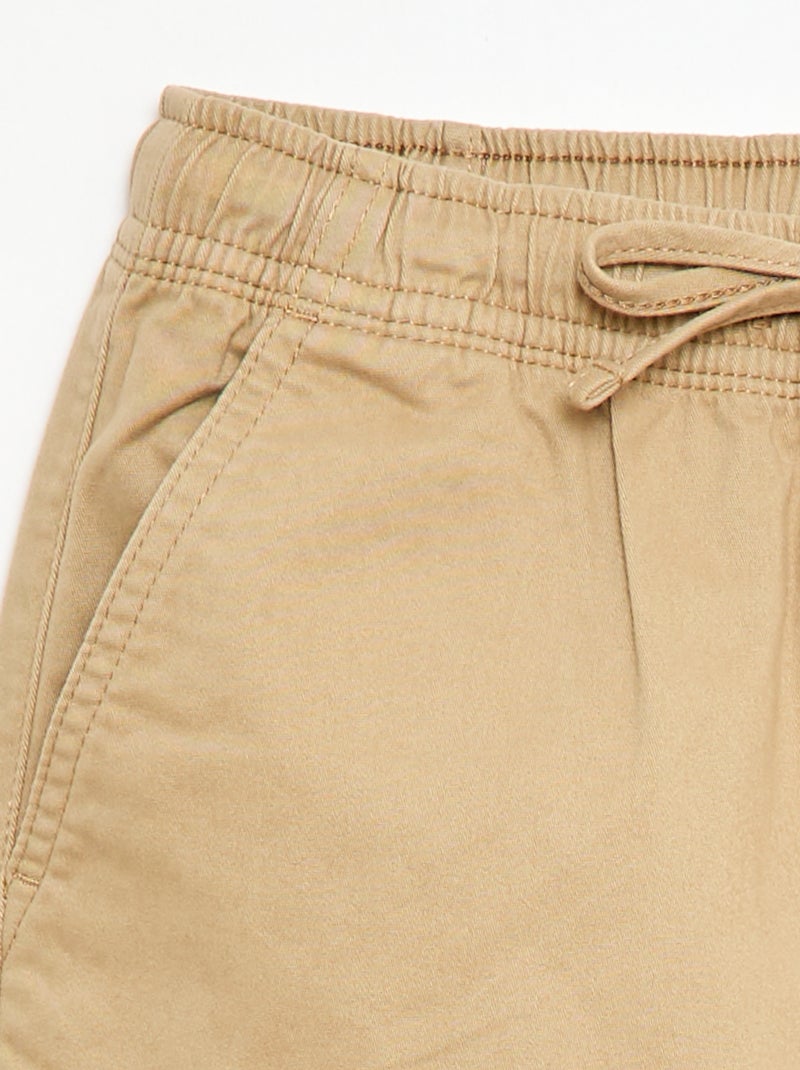 Effen stretch broek met meerdere zakken Biege - Kiabi