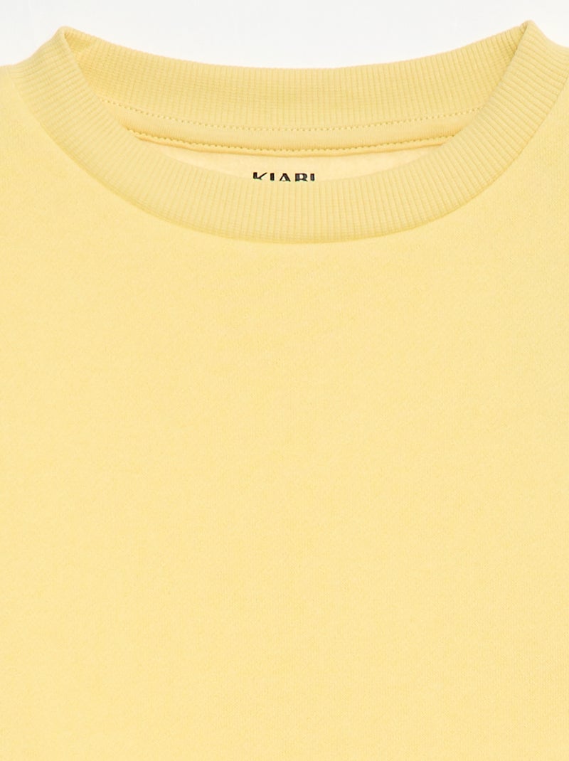 Effen sweater joggingstof met zachte, geruwde binnenzijde Geel - Kiabi