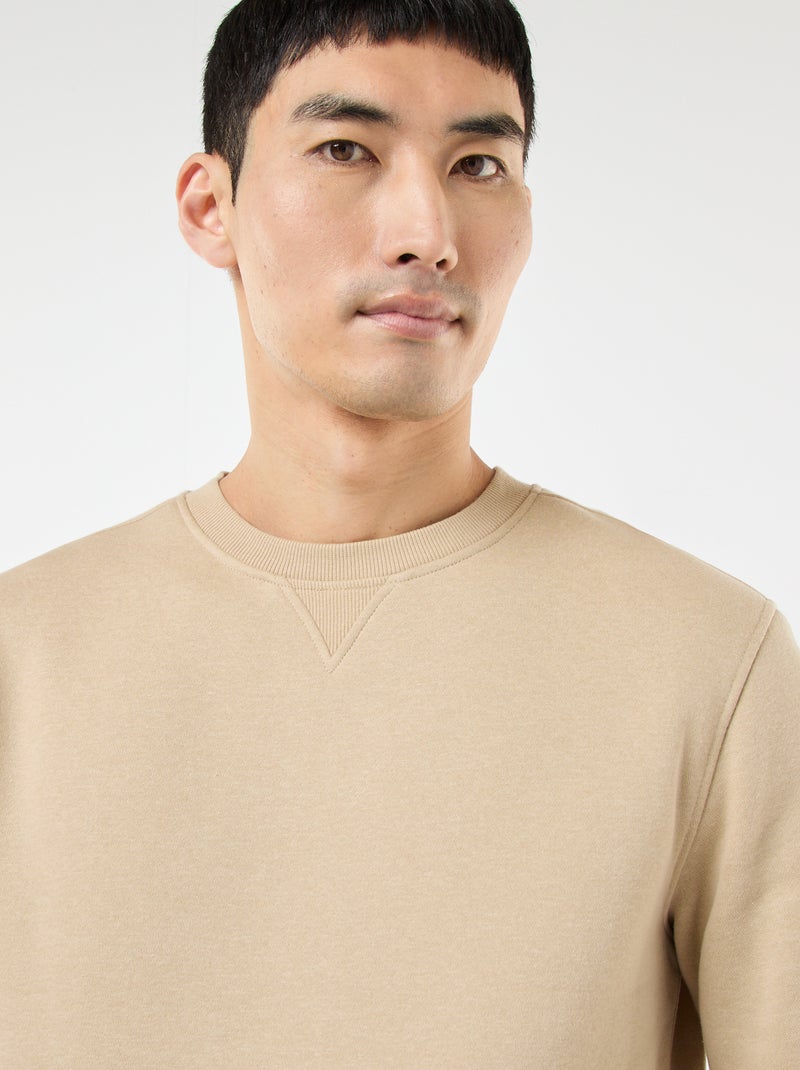 Effen sweater van geruwde fleece met ronde hals Biege - Kiabi