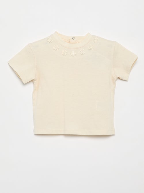 Effen T-shirt met fantasiebloemen aan de kraag - Kiabi