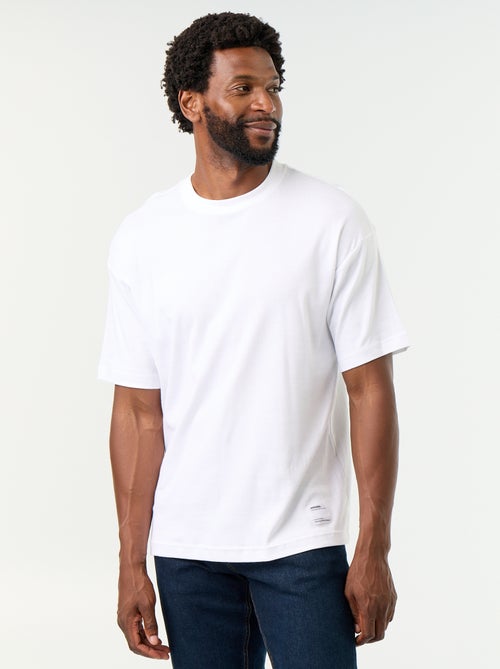 Effen T-shirt met korte mouwen en ronde hals - Kiabi Effen T-shirt met korte mouwen en ronde hals - Kiabi
