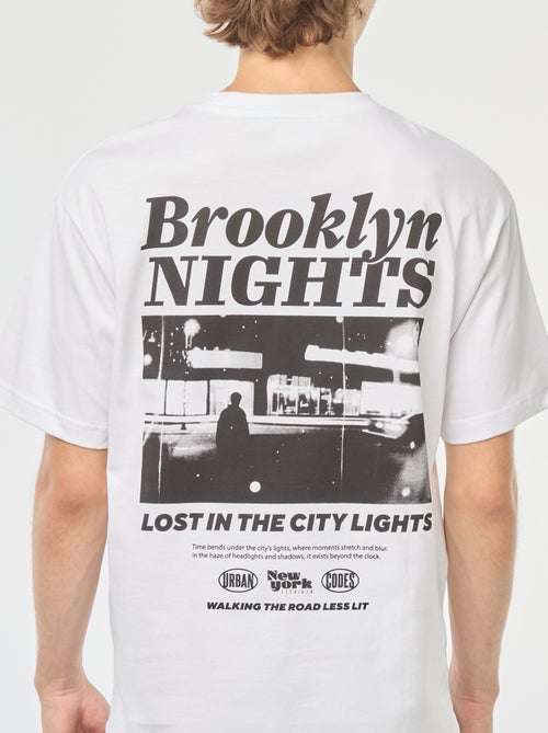 Effen T-shirt met lange mouw en print voor/achter - Kiabi Effen T-shirt met lange mouw en print voor/achter - Kiabi