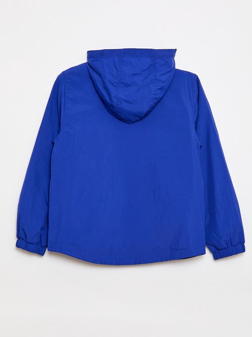 Effen windjas dat in de capuchon kan worden opgeborgen - Kiabi
