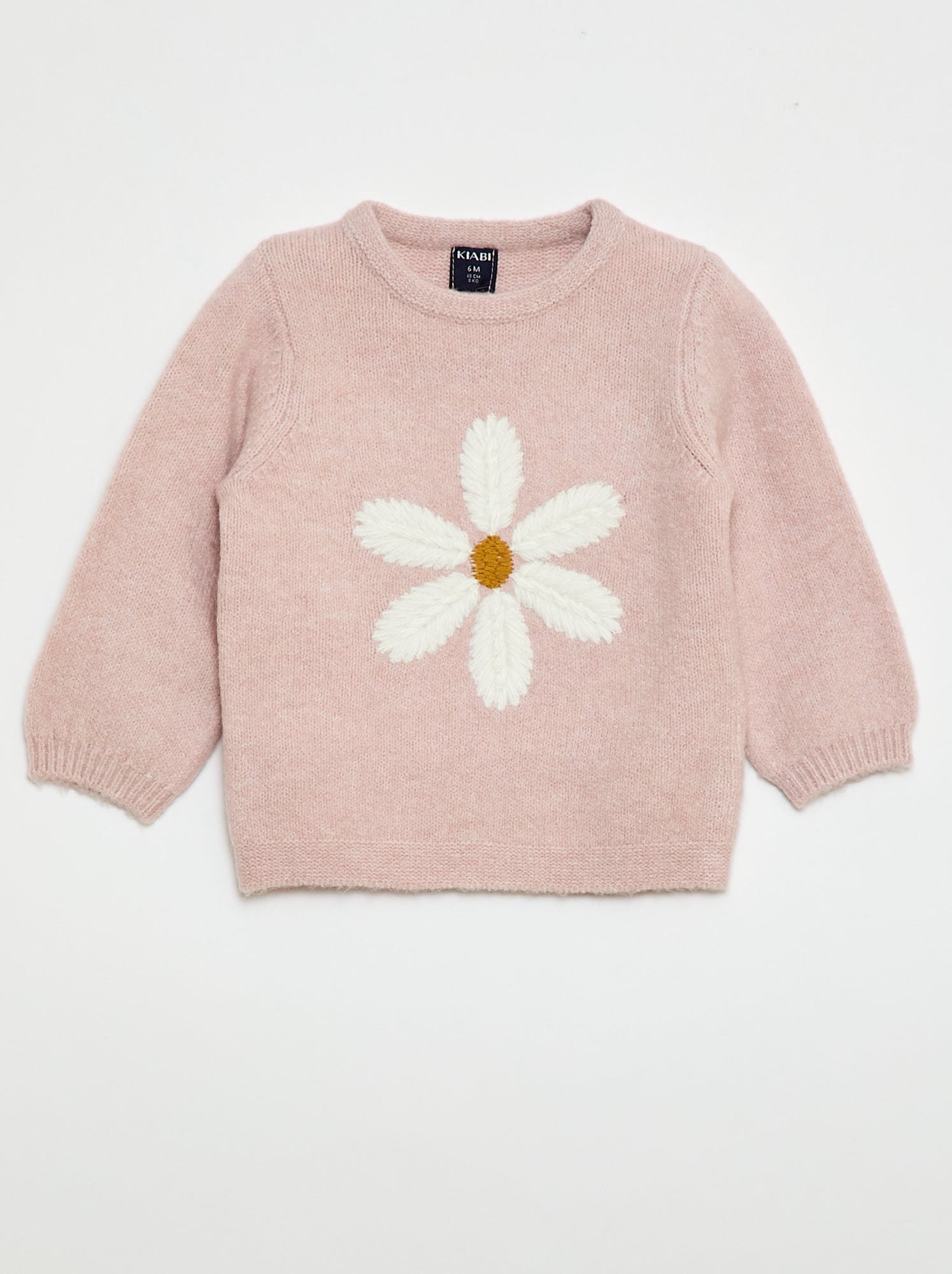 Gebreide trui met borduursel