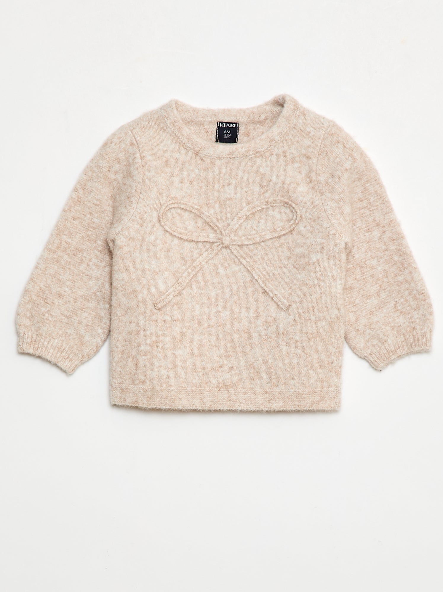 Gebreide trui met sierstrik op het voorpand