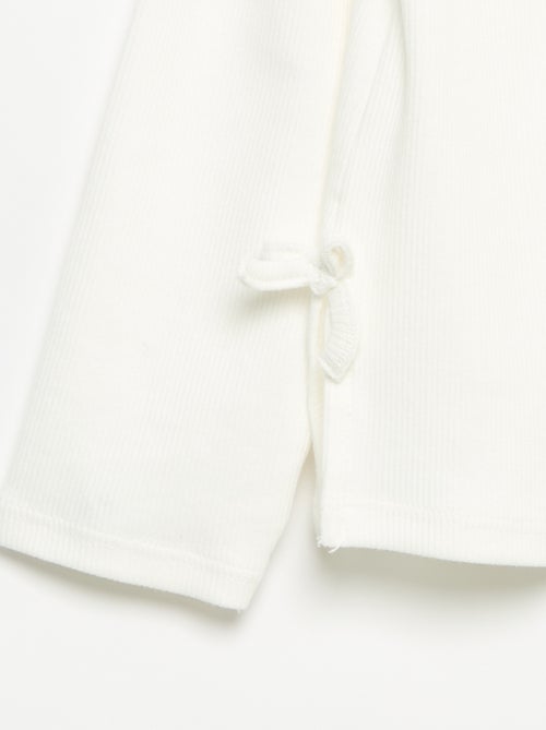 Geribbeld T-shirt met lange mouwen en strik - Kiabi