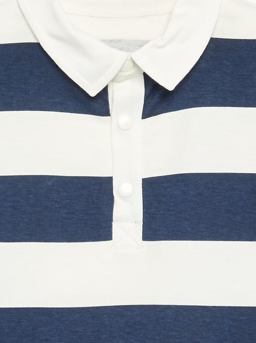 Gestreept poloshirt met lange mouwen - gemakkelijk aan te trekken collectie - Kiabi Gestreept poloshirt met lange mouwen - gemakkelijk aan te trekken collectie - Kiabi