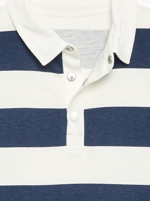 Gestreept poloshirt met lange mouwen - gemakkelijk aan te trekken collectie - Kiabi Gestreept poloshirt met lange mouwen - gemakkelijk aan te trekken collectie - Kiabi