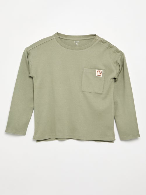 Gestreept T-shirt - gemakkelijk aan te trekken collectie - Kiabi Gestreept T-shirt - gemakkelijk aan te trekken collectie - Kiabi
