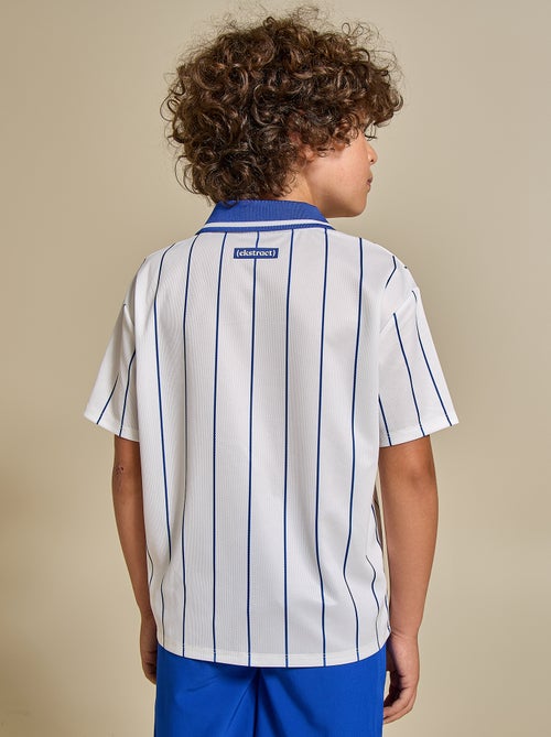 Gestreept voetbal T-shirt met korte mouwen - Kiabi Gestreept voetbal T-shirt met korte mouwen - Kiabi