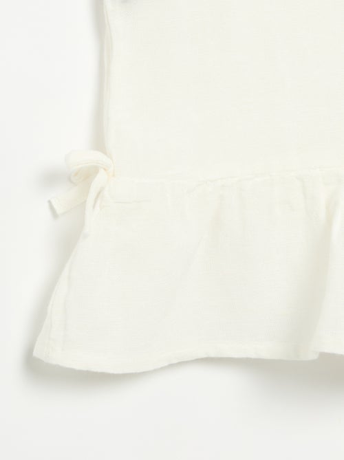 Gestreepte blouse met fantasie strikjes - Kiabi