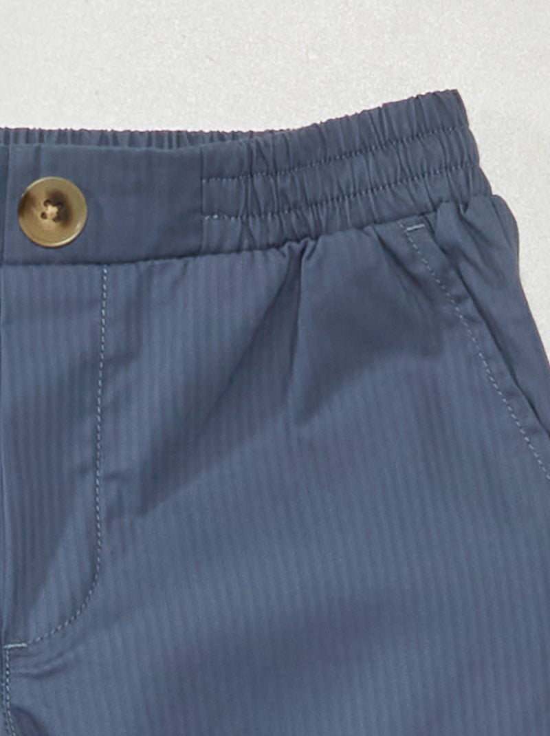 blauw wit gestreepte broek